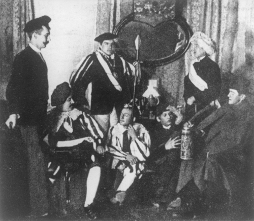The Montsalvat knighthood (ca. 1890), amongst the seated Gustav Cords (1st from left) und Reger (3rd from left). – Pictured in , fig. 18.